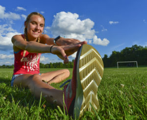 UHS' Caroline Kirby enjoying her time running with the Orange